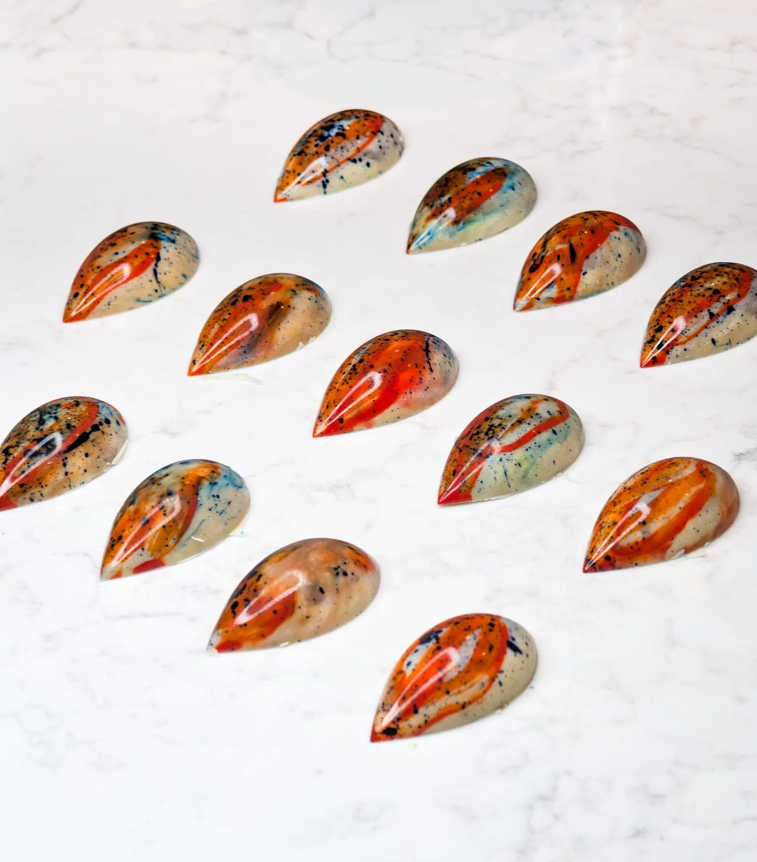 tear drop abstract white orange blue.jpeg