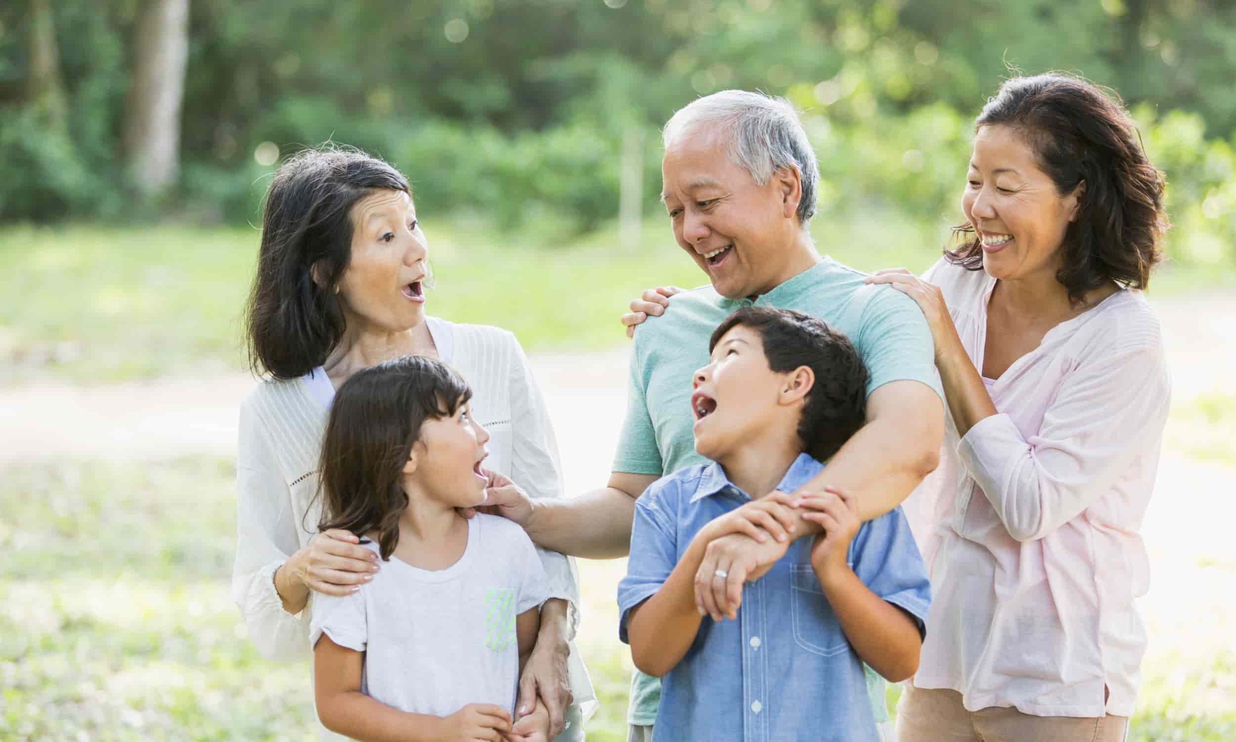 A family hugging and bonding, symbolizing the benefits of stem cell therapy for rejuvenation, regeneration, and long-term health and longevity.