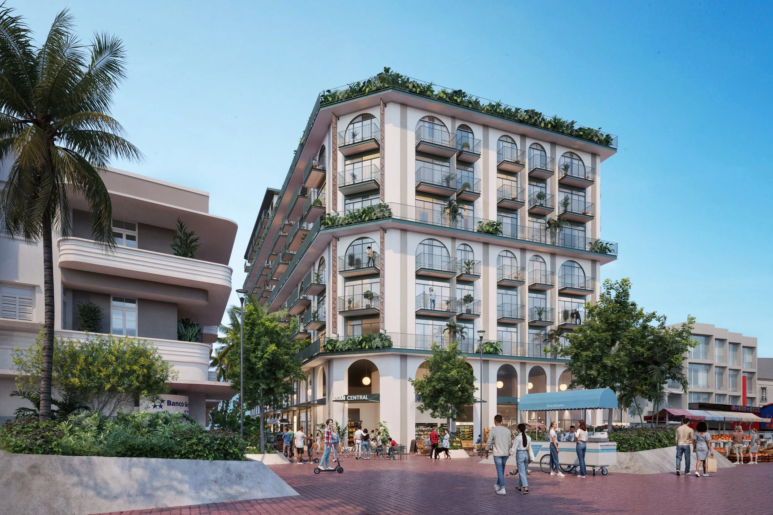 A modern multi-story building with balconies, surrounded by trees and a busy pedestrian area with people walking and shopping. There are street lamps and a small outdoor market with vendor stalls.