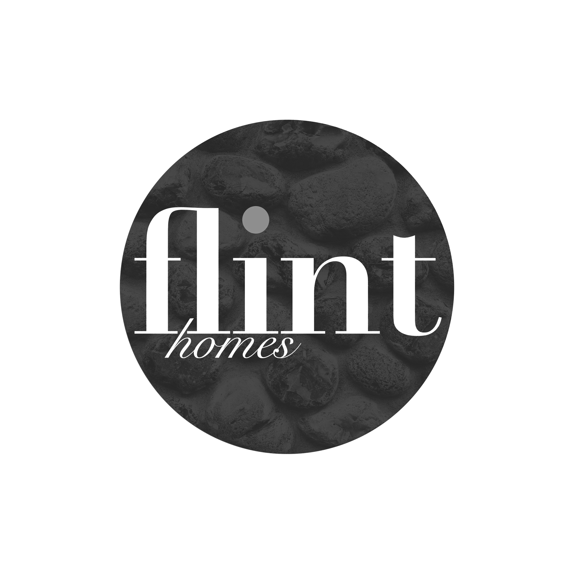 A circular logo with the text 'Print homes' over a background of dark stones.
