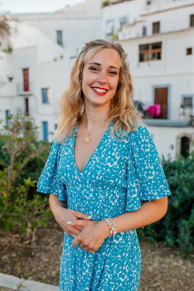 young woman in blue dress, name is Sophie Fraro Author