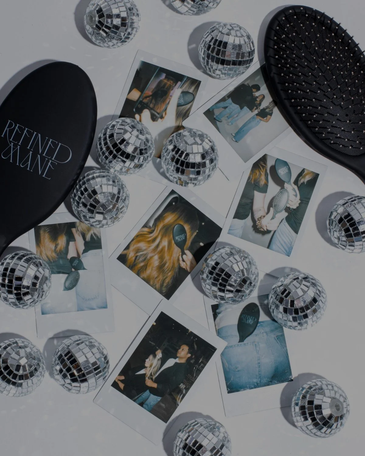 Refined Mane hair tools collage featuring disco balls, polaroid photos, brushes, and silk scrunchies.