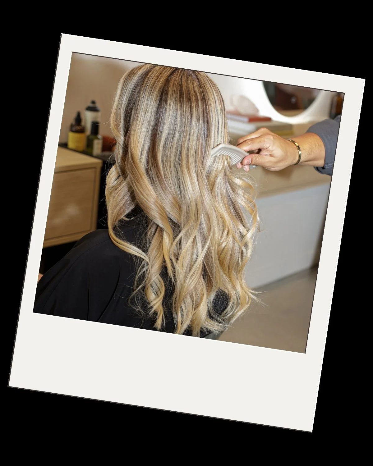 Polaroid photo of combing hair.