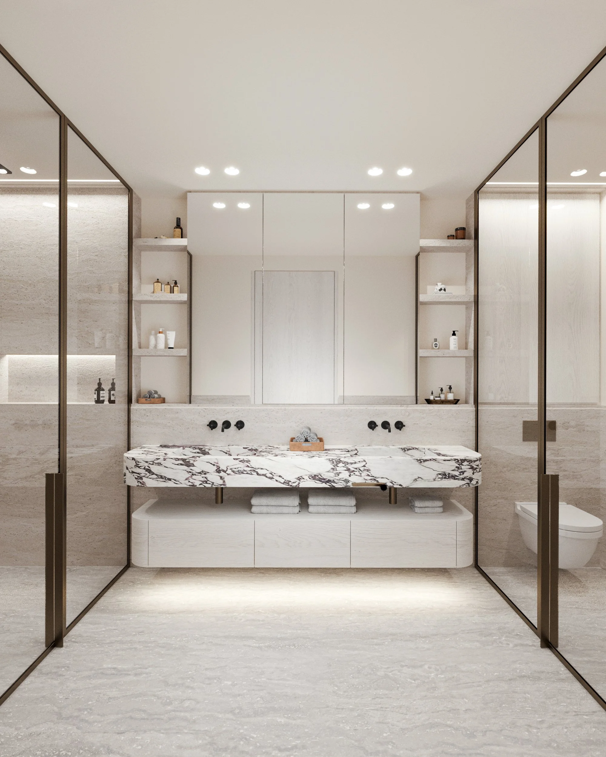 Salle de bain moderne avec une double vasque en marbre, étagères intégrées, murs et sol en teintes neutres, et une paroi en verre séparant la douche et les toilettes.