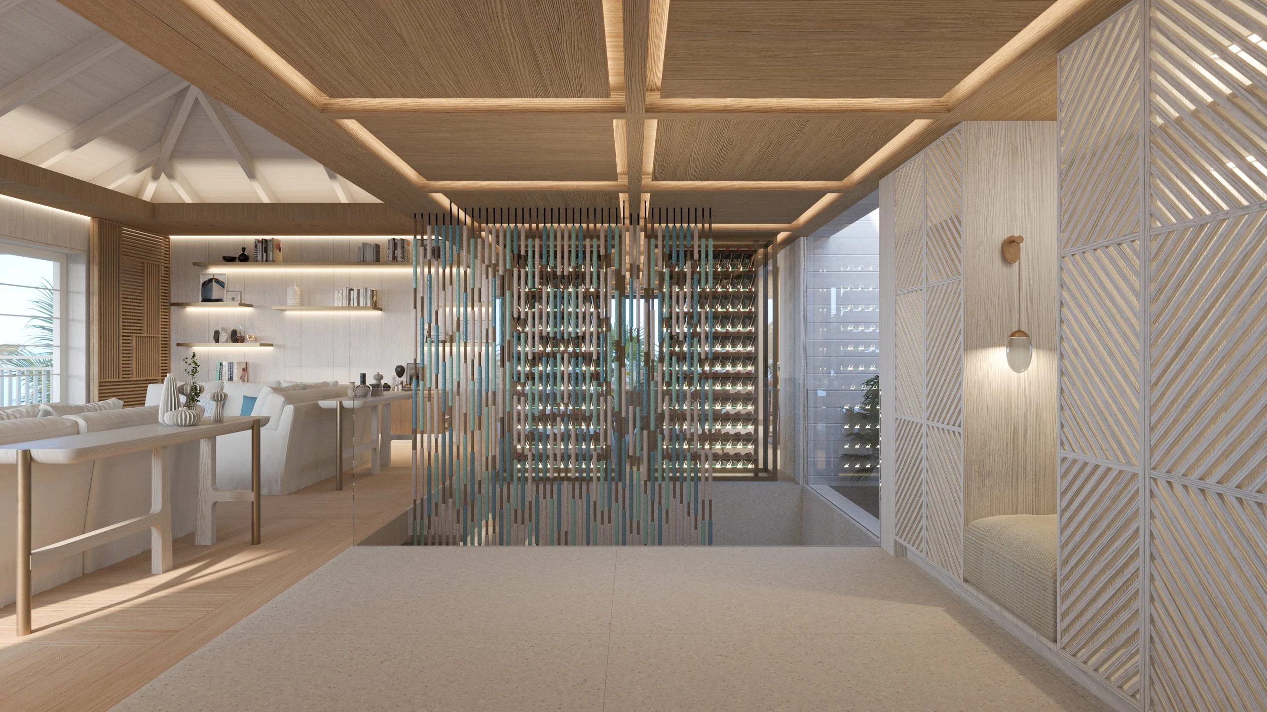 Intérieur moderne d'une maison avec un espace salon et une bibliothèque en fond, décorée en bois clair avec des meubles blancs et des étagères décoratives.