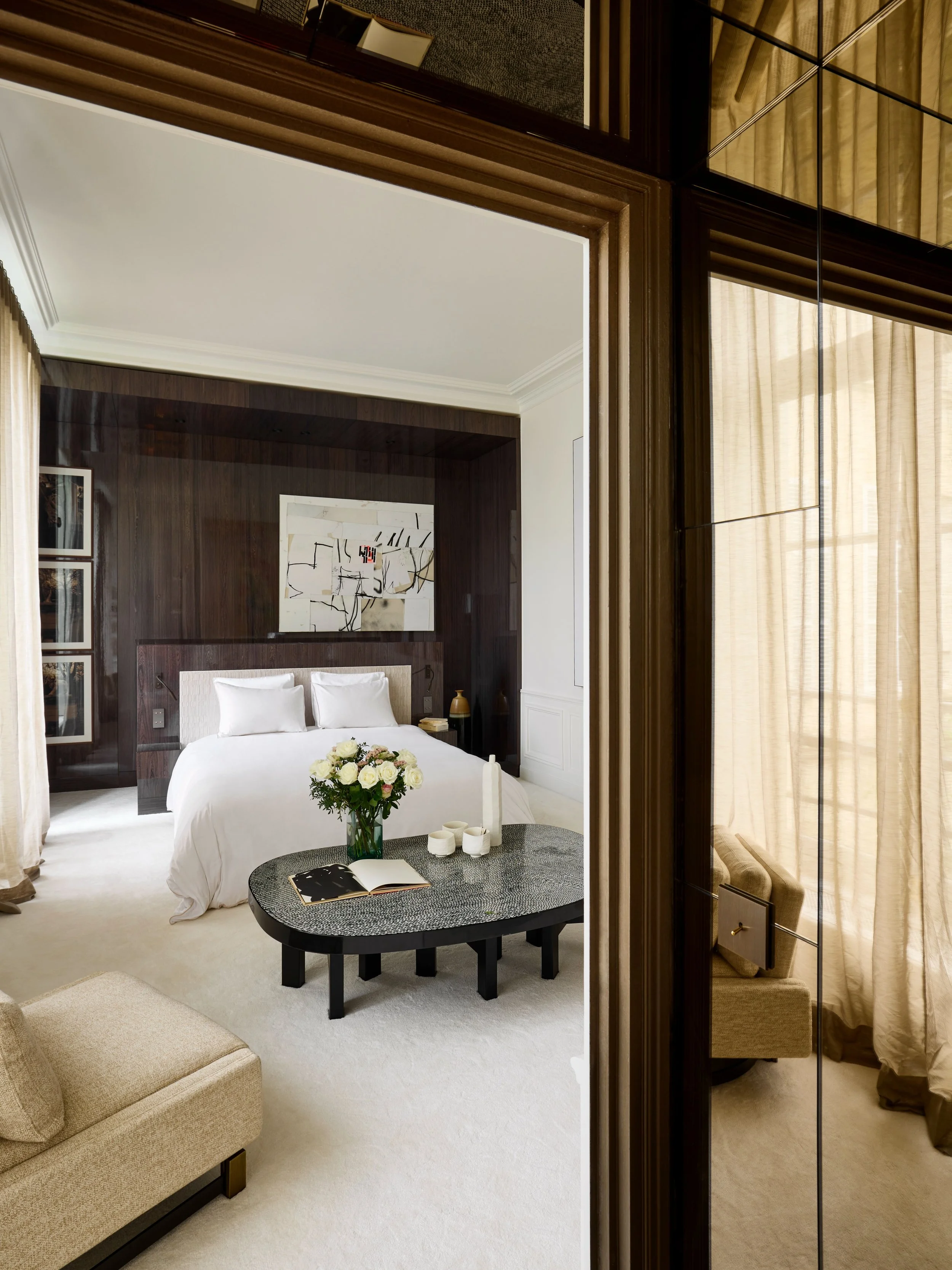 Clean composition defined by soft tones and precise lines. Natural light, artwork and carefully selected furniture create a calm and balanced bedroom.

Photographer : @francisamiand 

#interiorarchitecture #luxuryinteriors #villadesign
#interiordesig