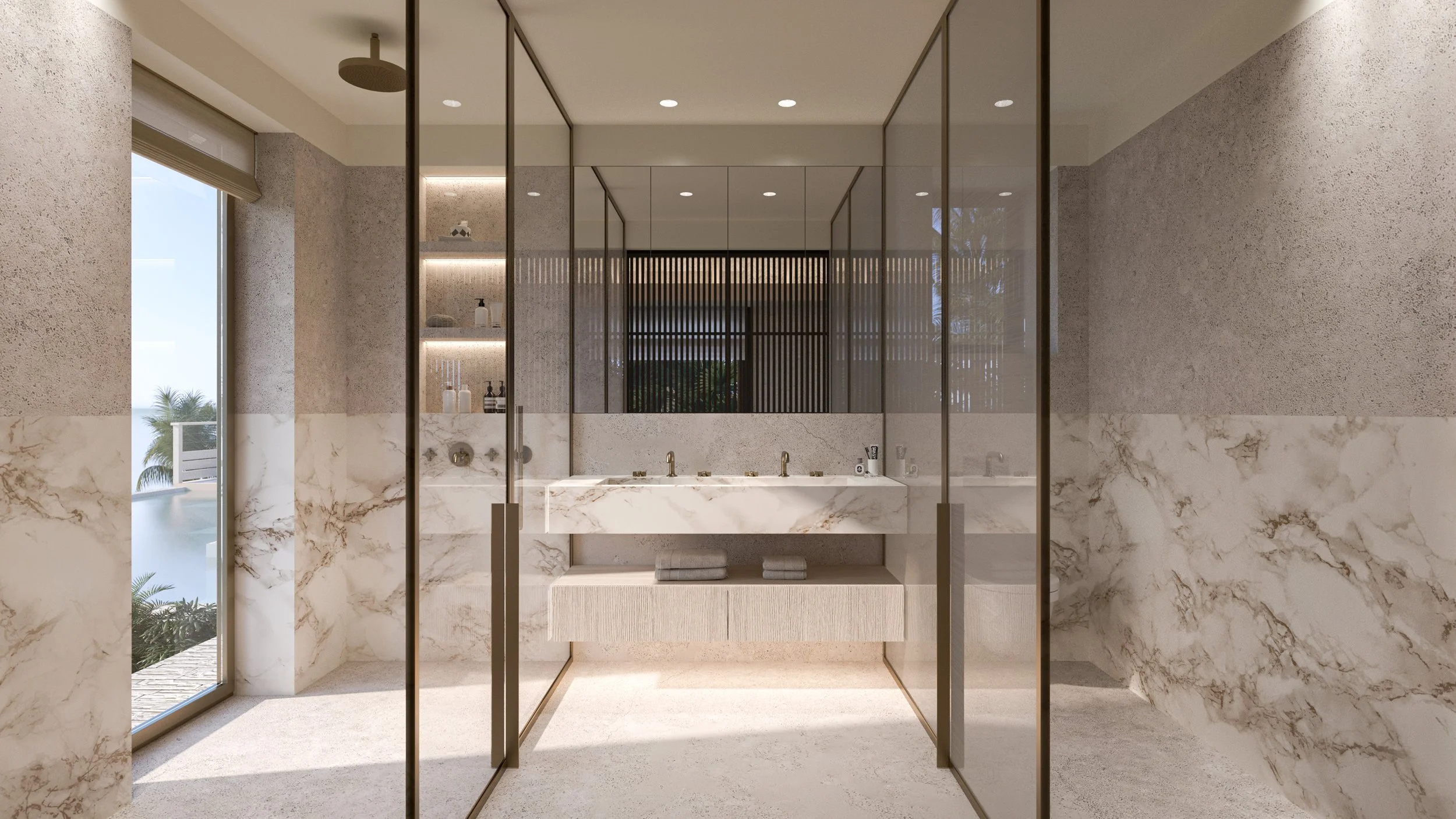 Salle de bain moderne avec murs en marbre clair, grande fenêtre avec vue sur un balcon, lavabo en marbre, miroirs en verre, étagères avec produits de bain, et un éclairage intégré