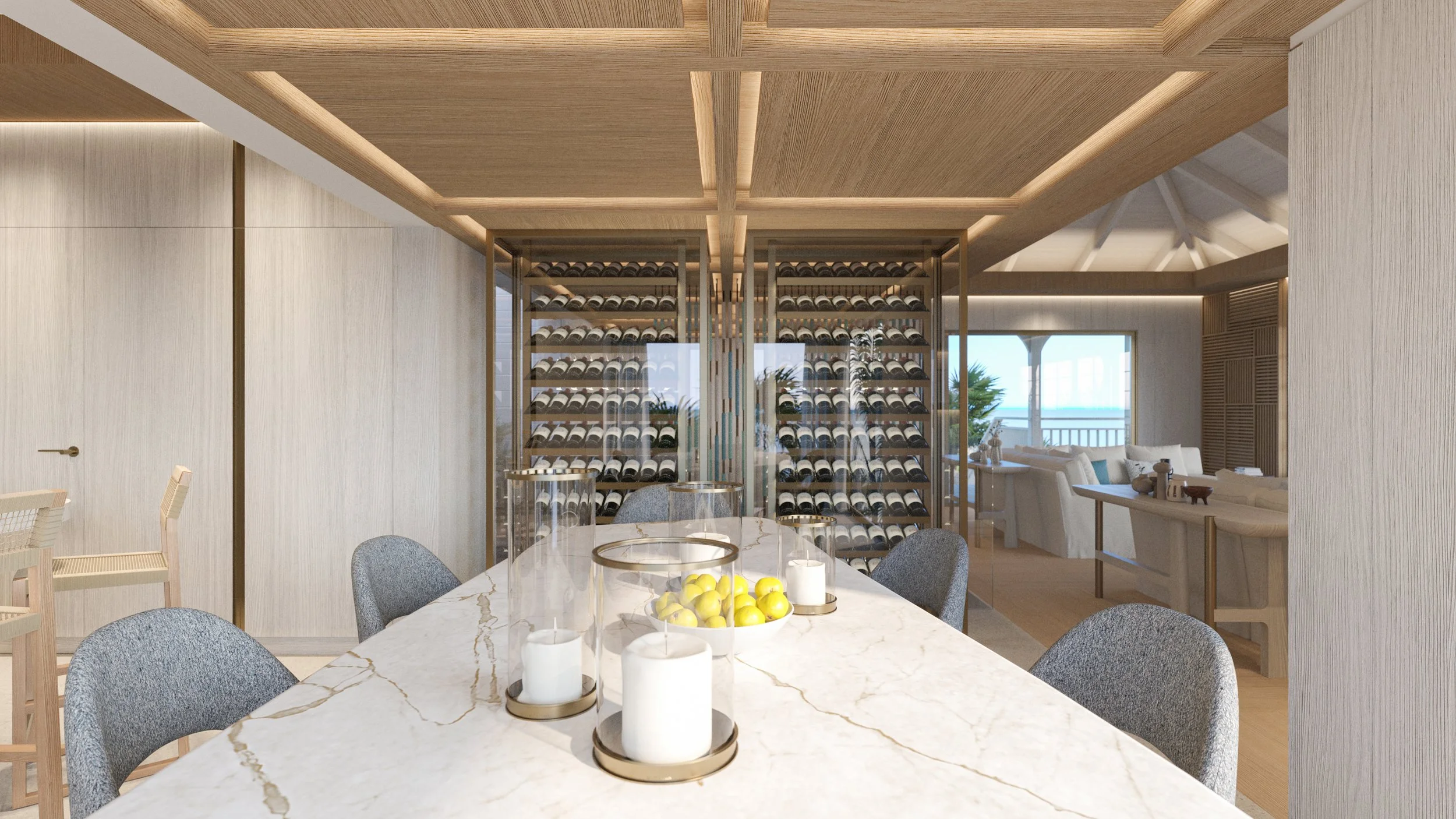 Intérieur moderne d'une salle à manger avec une table en marbre, chaises grises, un mur de rangement à vin en verre, et un salon en arrière-plan avec vue sur la mer.