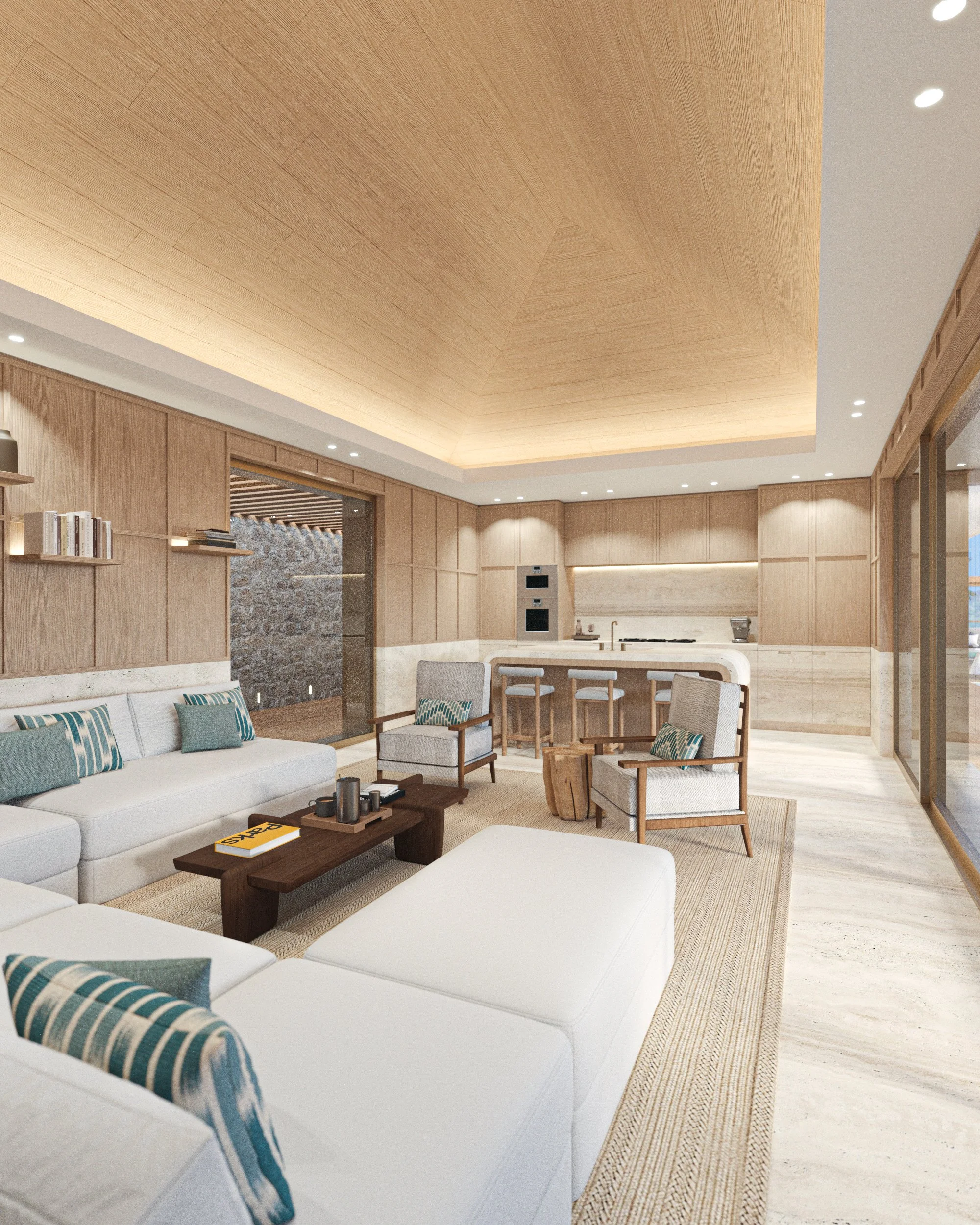 Salon de séjour moderne avec canapés blancs, fauteuils en bois et coussins verts, cheminée, bibliothèque et cuisine ouverte en arrière-plan dans une maison en bois lumineuse.