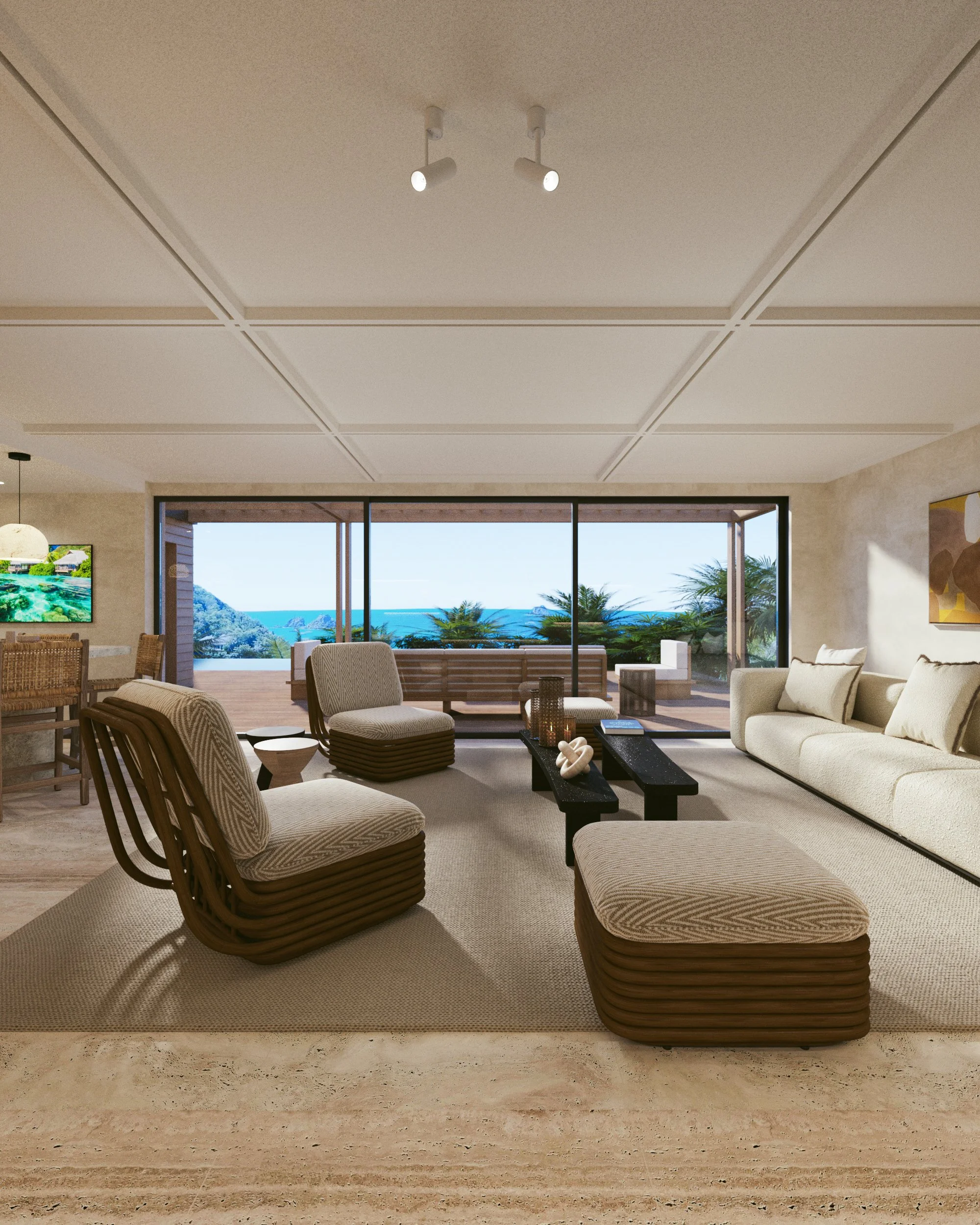 Salon lumineux avec vue sur la mer, canapé beige, fauteuils en bois courbés, table basse noire, décoration moderne, grande baie vitrée avec terrasse et paysage côtier.