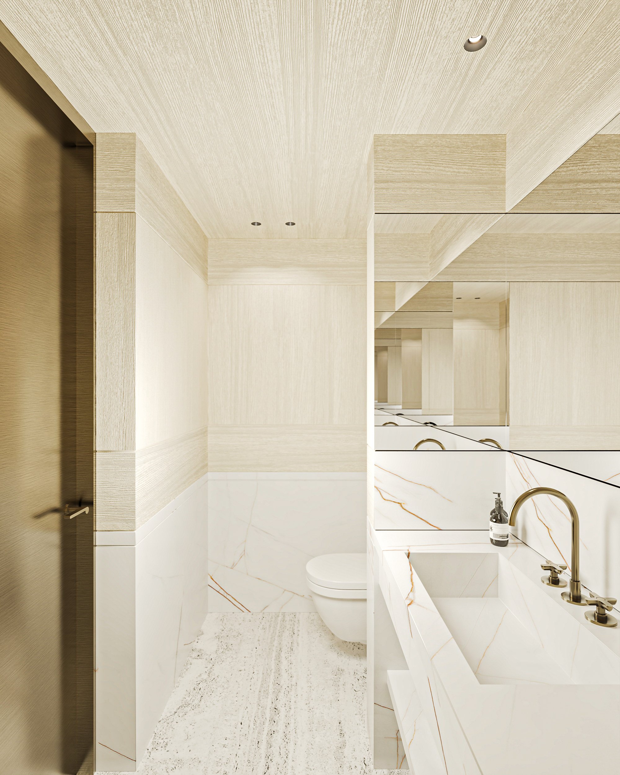 Salle de bain moderne avec lavabo en marbre, robinetterie en or, WC suspendu, murs en marbre et bois clair, miroir au mur et plafond