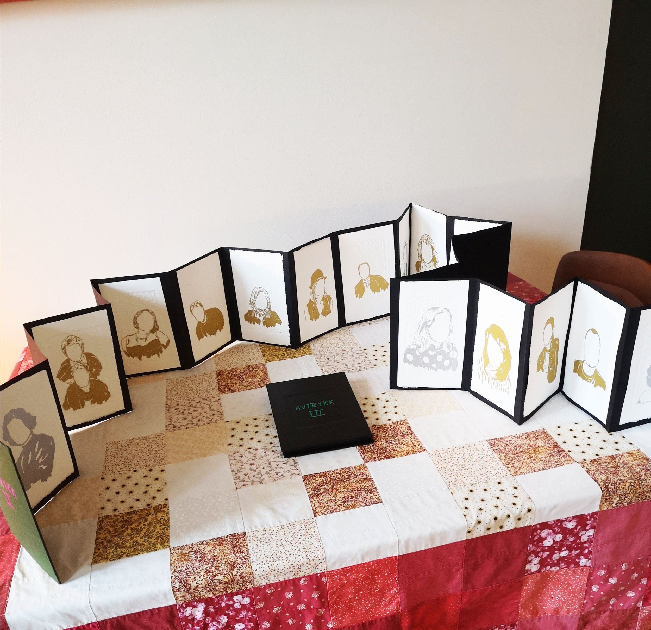 Family portraits, heat transfer vinyl on blind relief on Somerset Velvet, 2022. Photo: I.T.K