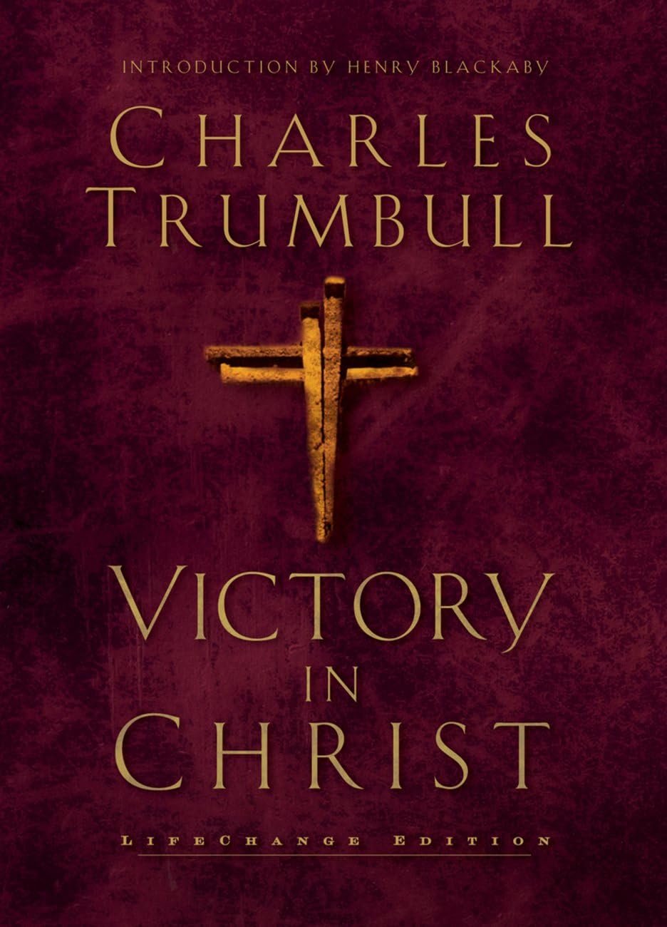 Book cover titled "Victory in Christ" by Charles Trumbull, with an introduction by Henry Blackaby, in a burgundy and gold color scheme featuring a cross.