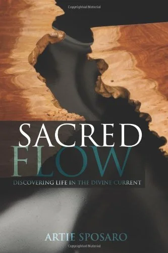 Book cover titled "Sacred Flow: Discovering Life in the Divine Current" by Artie Sposaro, featuring a river flowing between wooden banks with a dark background.