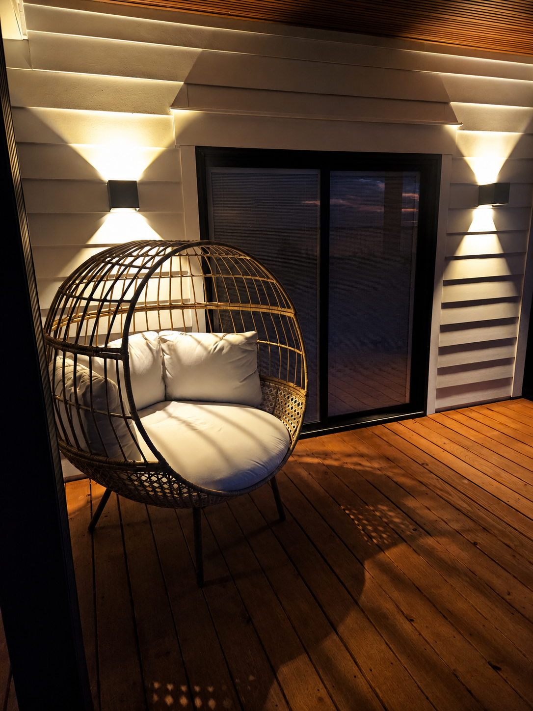 Beachriver_Primaryroom_walkout Patio with Exlarge _Egg chair.png