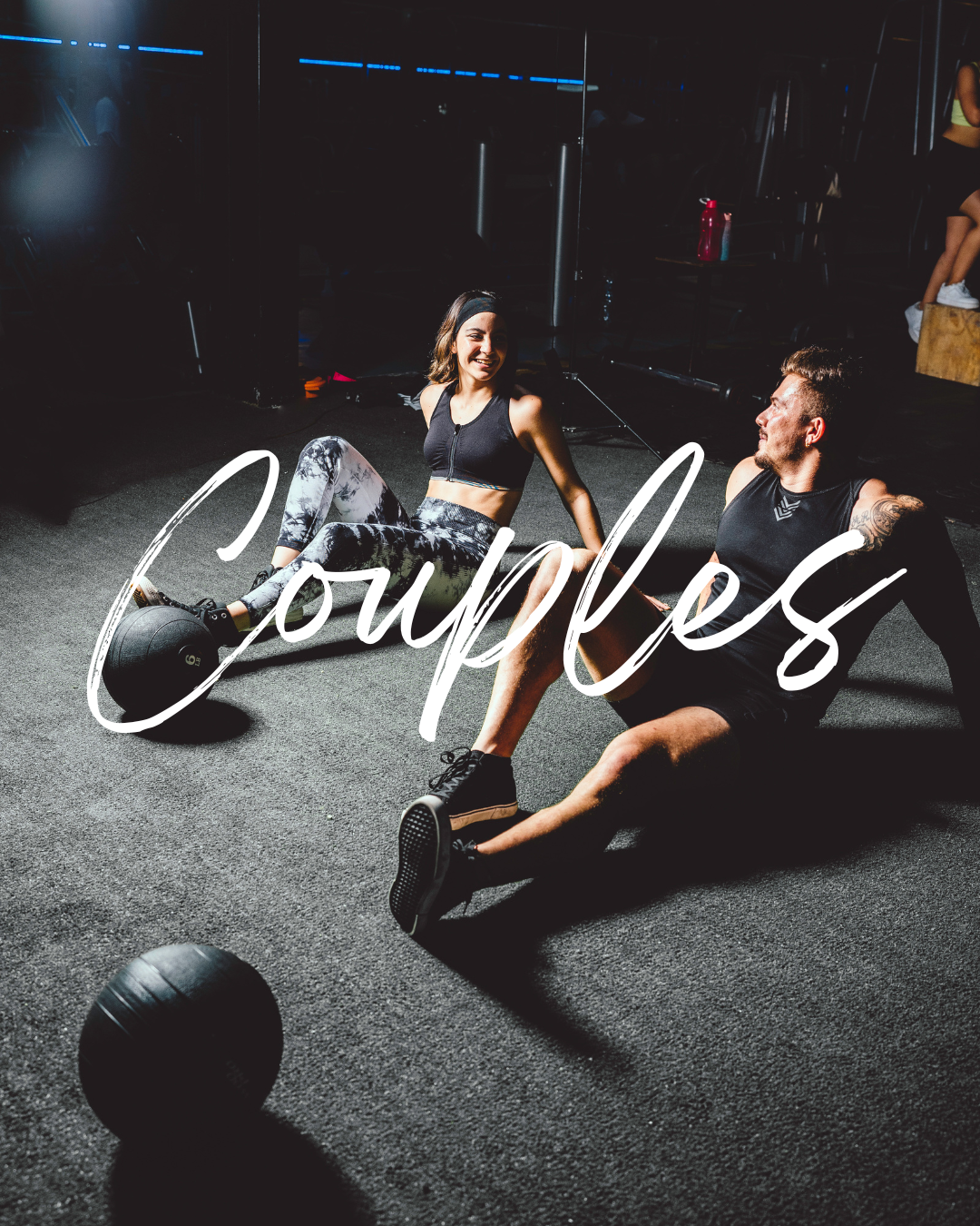 Two people exercising on the gym floor, smiling and engaging with each other, with the word 'Courage' overlaid.