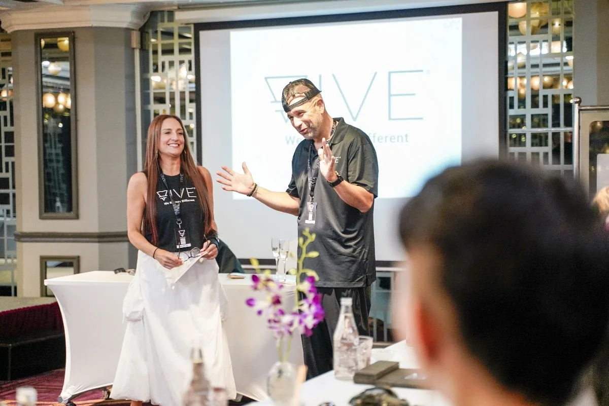 Michelle Ruiz and the team at VIVE Society Travel hosting welcome meeting at hotel in Vietnam