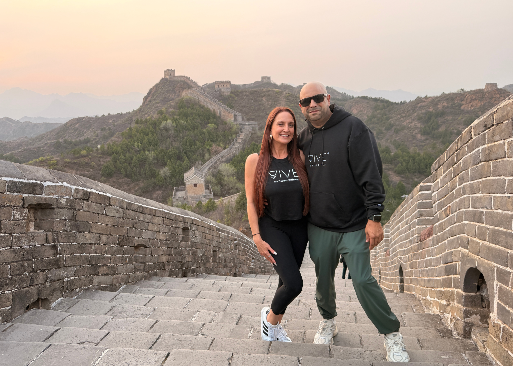 Owners of VIVE Society Travel at the Great Wall of China