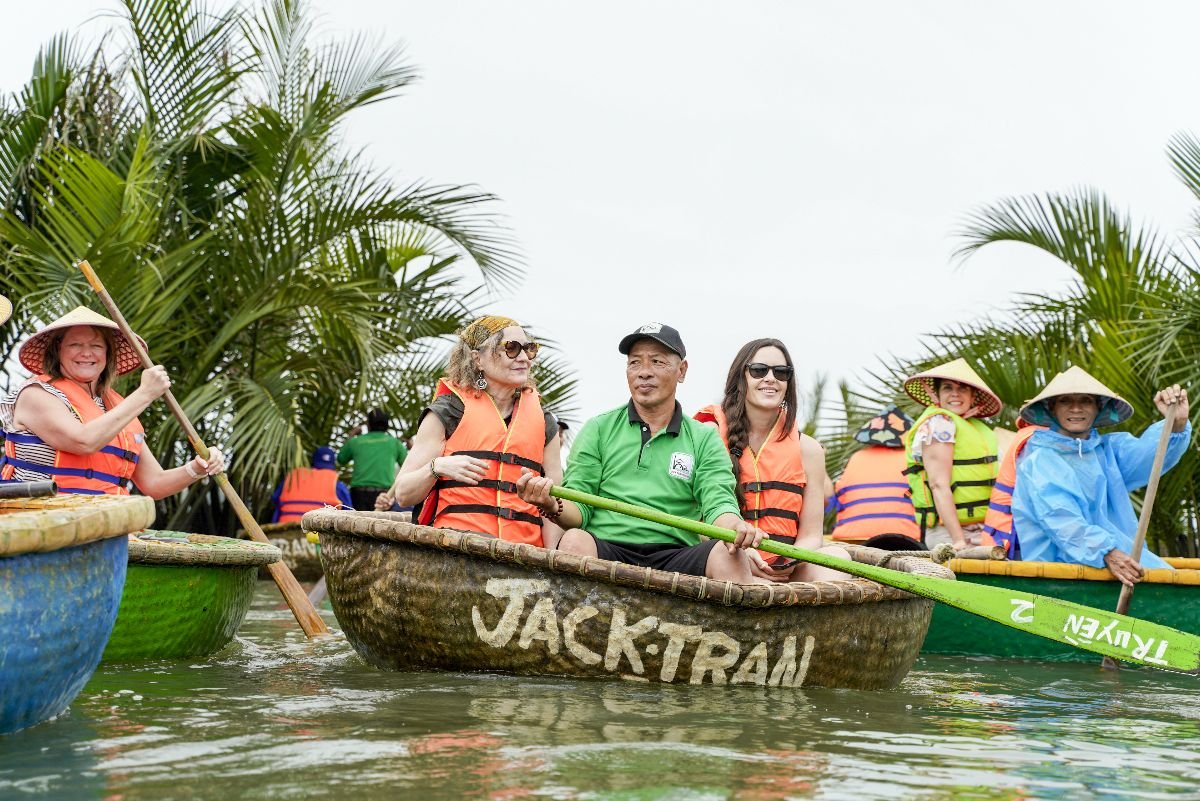 Travelers on VIVE Society Group Tour in Vietnam Basket Boat Ride