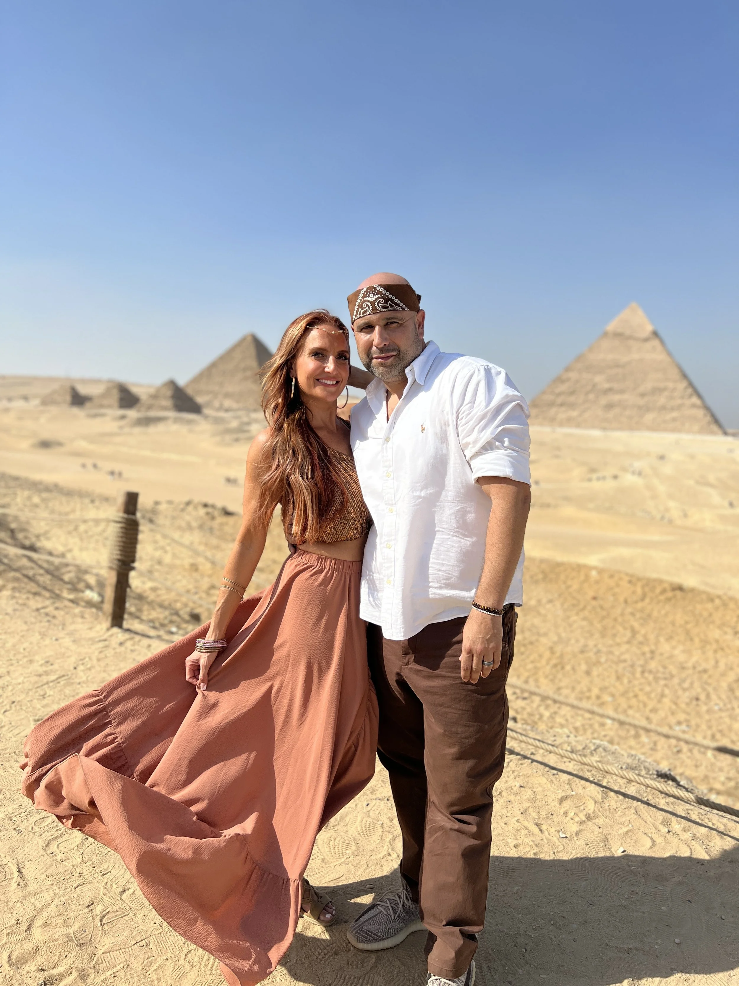 Michelle Ruiz and husband at the Great Pyramids of Egypt