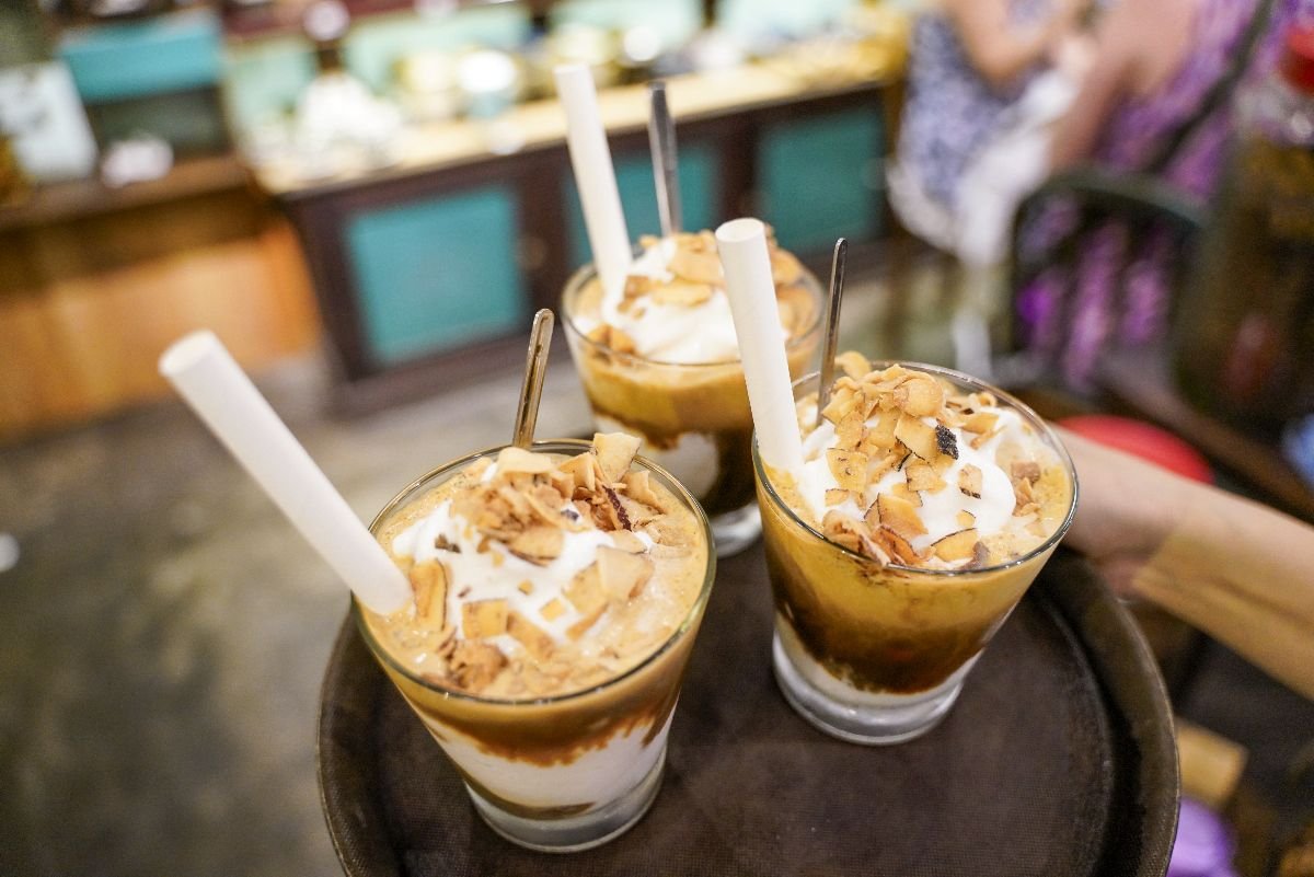 Coconut coffee with shredded coconut on top