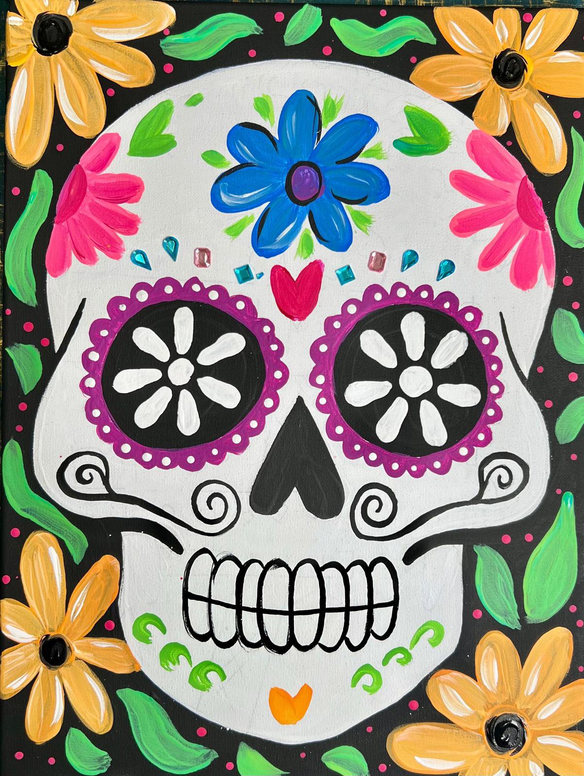 Colorful sugar skull decorated with floral and heart motifs, surrounded by bright flowers and vibrant patterns on a black background.