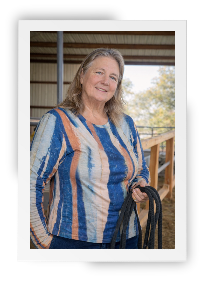 MaryBeth, founder of HorseSpeak, standing at Cowgirl Up Ranch holding a lead rope.