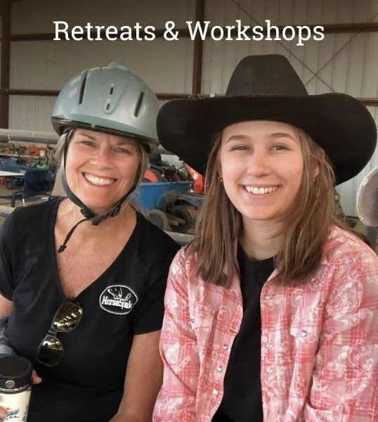 Two women standing together at Cowgirl Up Ranch during a HorseSpeak retreat or workshop, smiling in a relaxed outdoor setting.