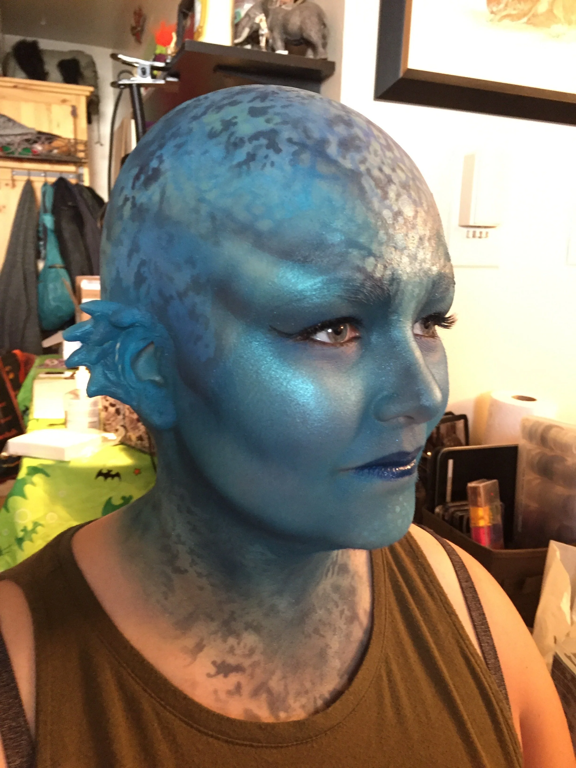 Bald cap, prosthetic ears, body painting