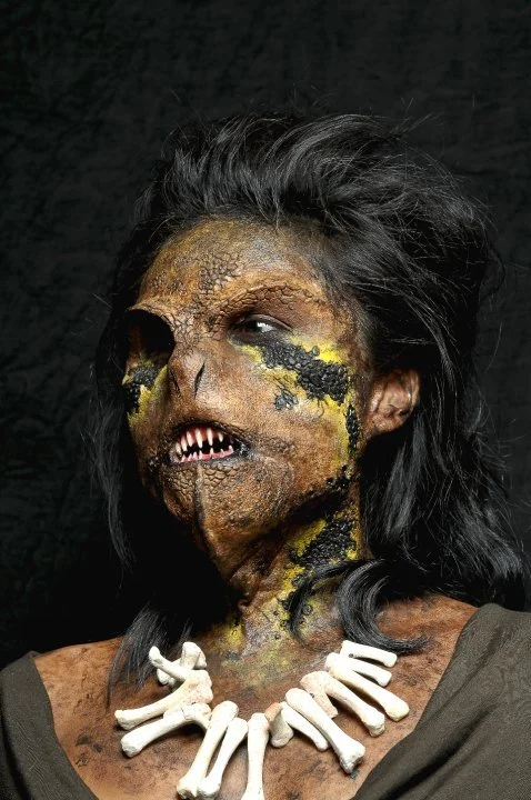 Prosthetic lizard lady