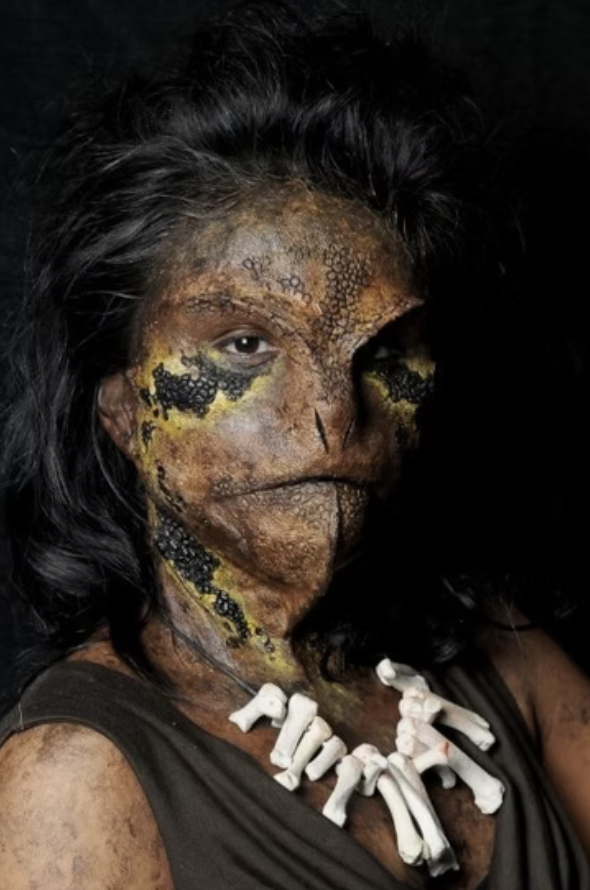 Prosthetic lizard lady