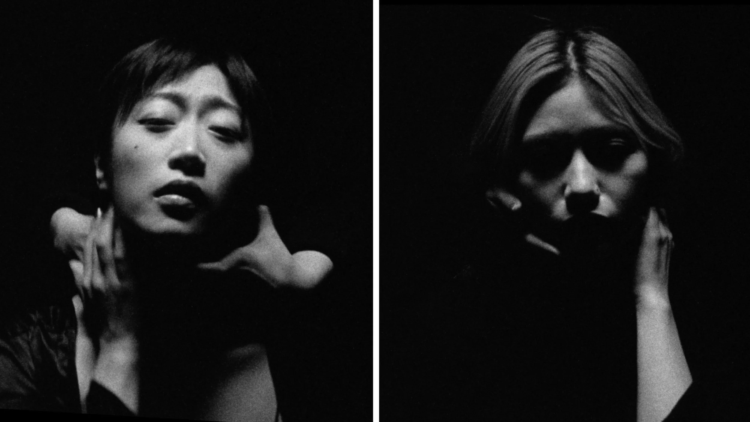 Black and white split image of two women with short hair, one with darker skin and the other with lighter skin, both touching their faces with hands in a dramatic pose.