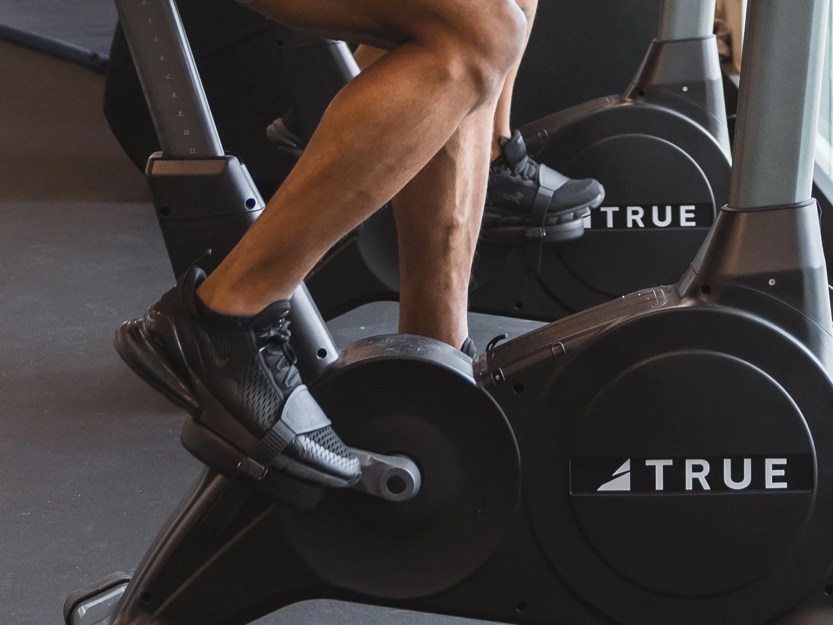 Man using an exercise bike.