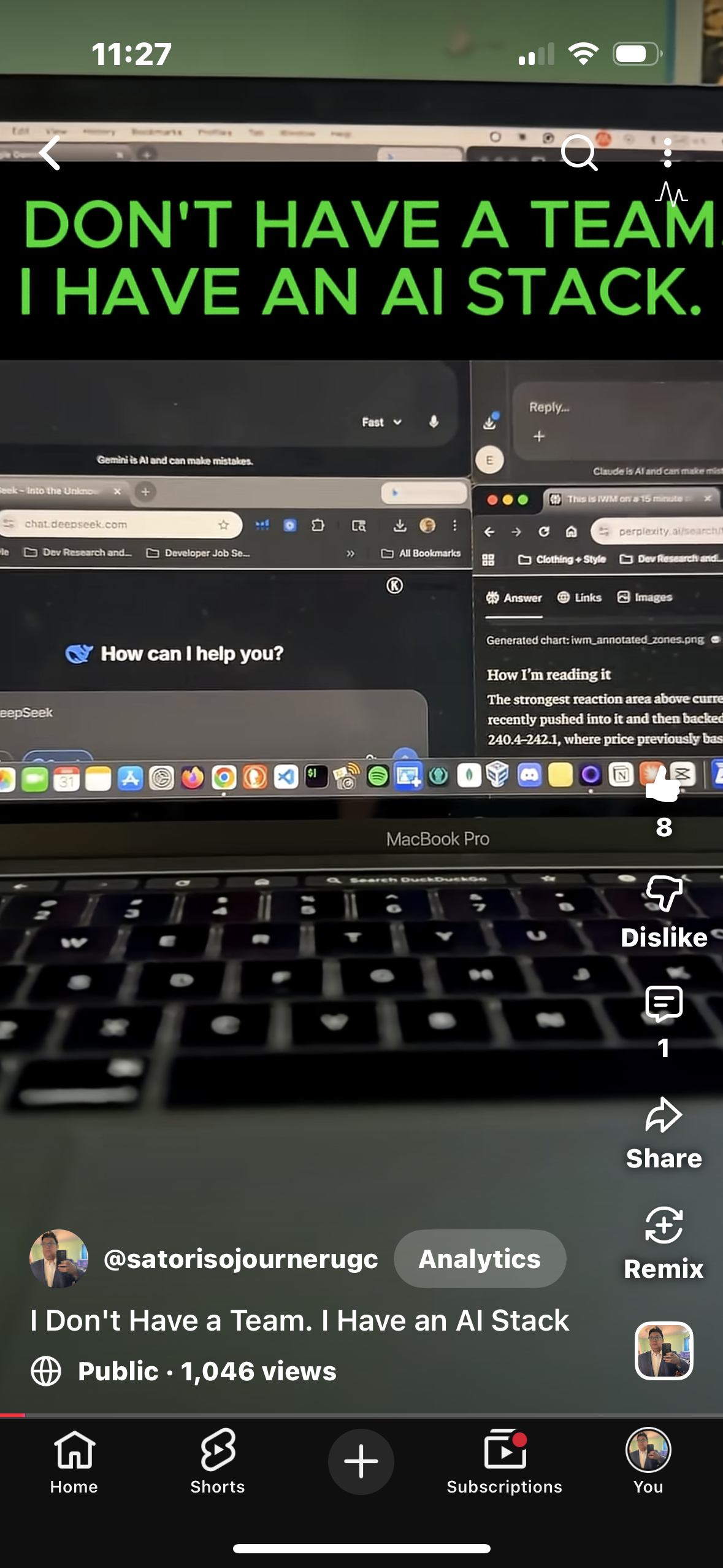 Screenshot of a laptop screen showing a social media post with large green text reading 'DON'T HAVE A TEAM I HAVE AN AI STACK.' The post is by @satorisjournerug and has 1,046 views. The laptop is a MacBook Pro, and the background shows multiple open browser tabs and app icons, with a focus on the keyboard at the bottom.