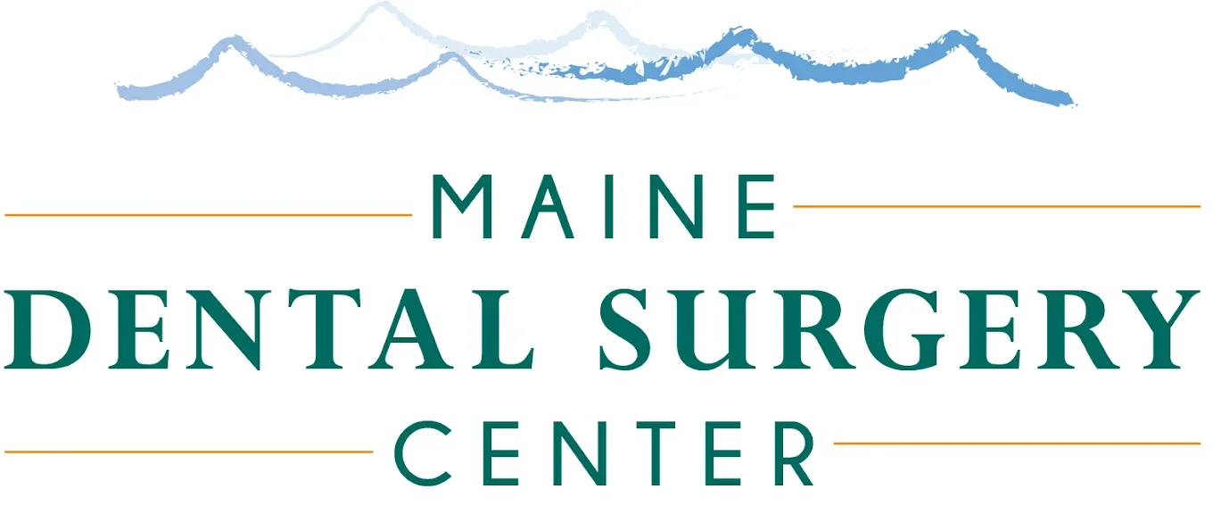 Logo for Maine Dental Surgery Center with a mountain illustration above the text.