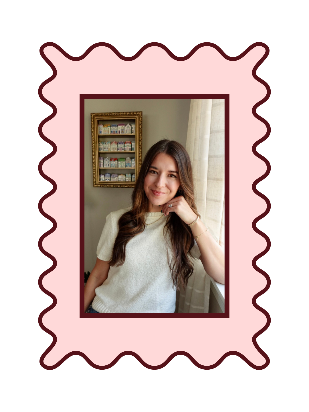 Young woman by window with a soft smile, long brown hair, and a white t-shirt. Picture is of Tierney Robb, founder of Chesapeake Socials.