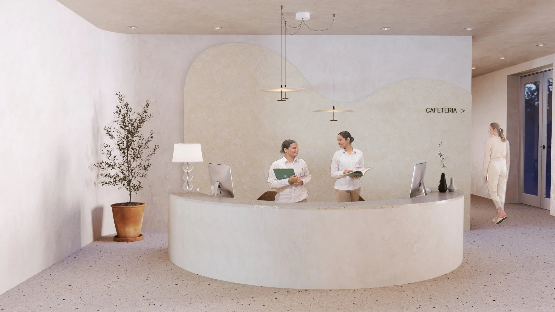 Modern hospital reception desk with two staff members talking, a woman walking in, and a sign pointing to the cafeteria.