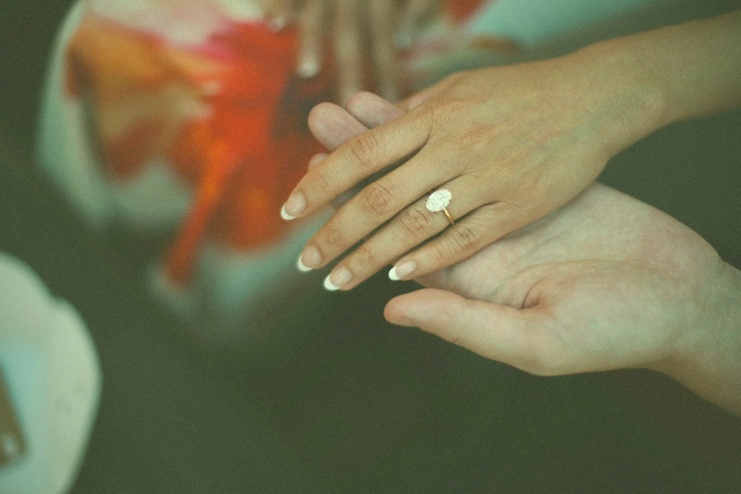 couples hands with rings