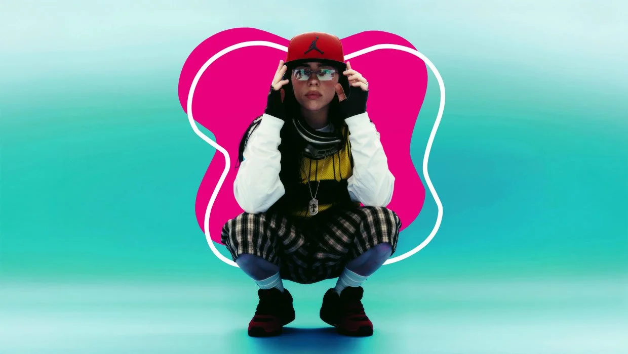 A young woman squatting against a colorful artistic background, wearing a red baseball cap with a black logo, reflective sunglasses, a white and black jacket, plaid pants, and black sneakers, with a necklace featuring a dog tag.