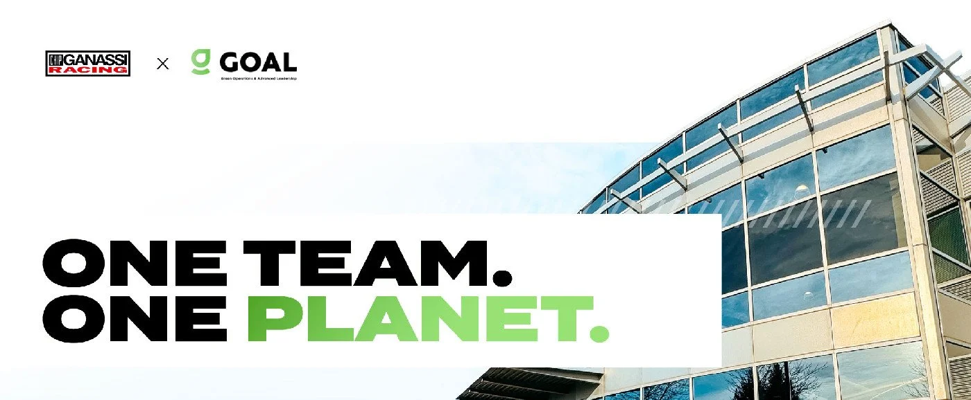 Logo of Chip Ganassi Racing and Goal with a modern glass building in the background, and the text 'One Team. One Planet.'