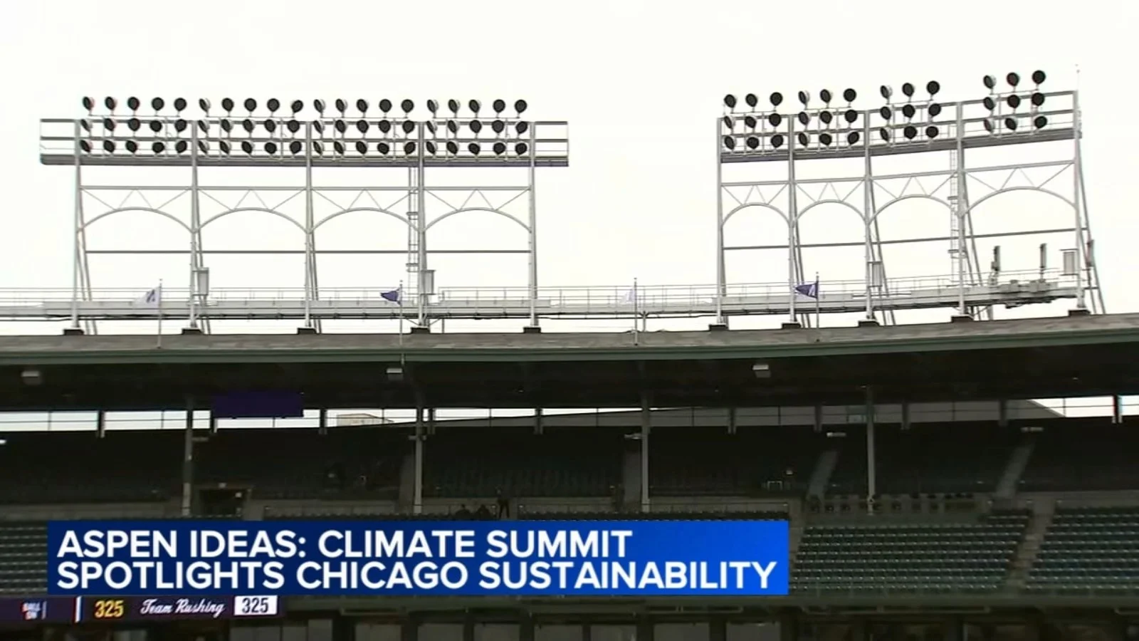 Empty stadium stands with large stadium lights on top, overlaid with a news banner about climate summit and sustainability.