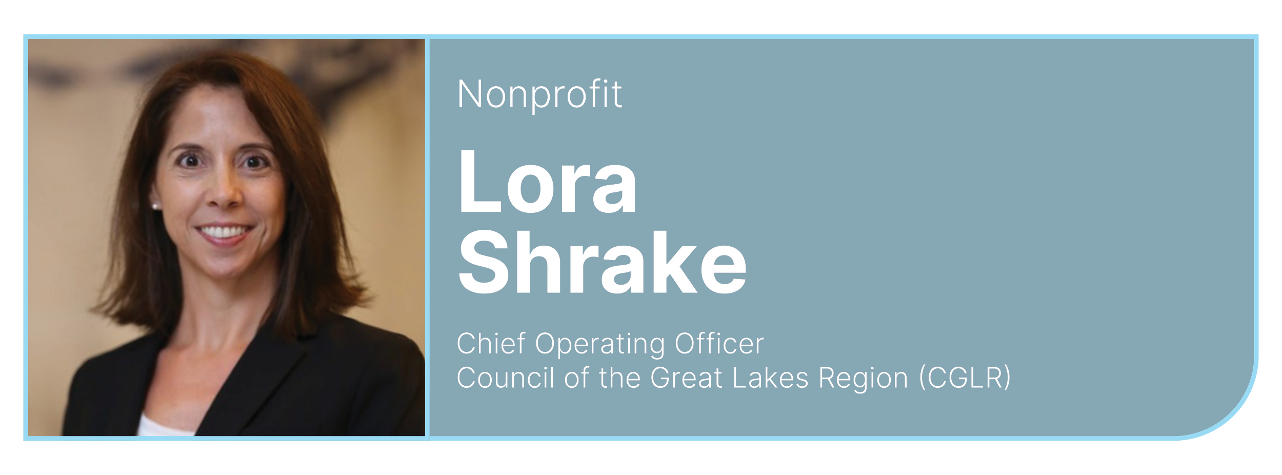 Photo of Lora Shake, Chief Operating Officer at the Council of the Great Lakes Region, smiling in a professional setting.