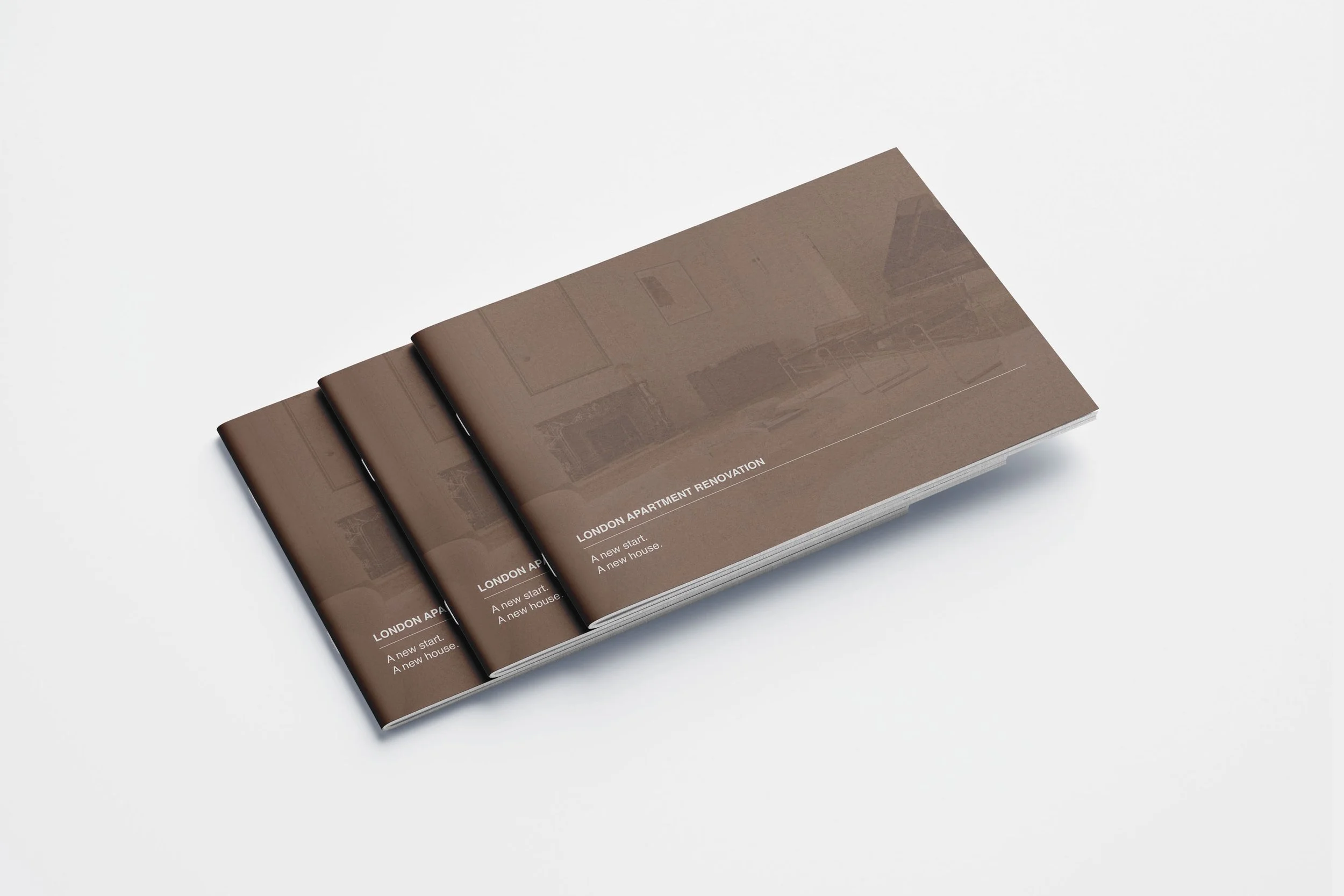 Folded brochures titled 'London Apartment Renovation' on white background.