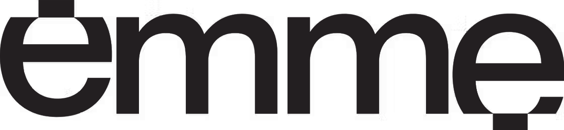 The image shows a logo of EMME WORKS , written in white