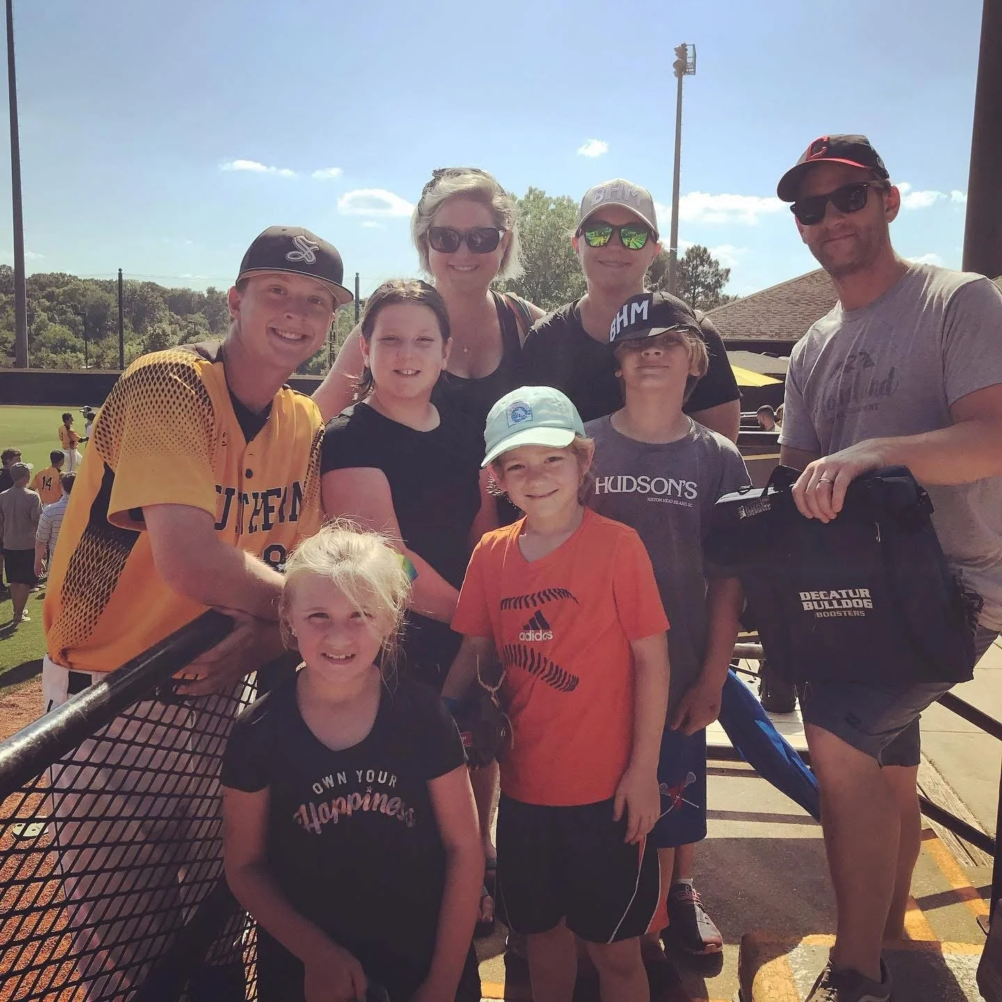 With family at brother's baseball game