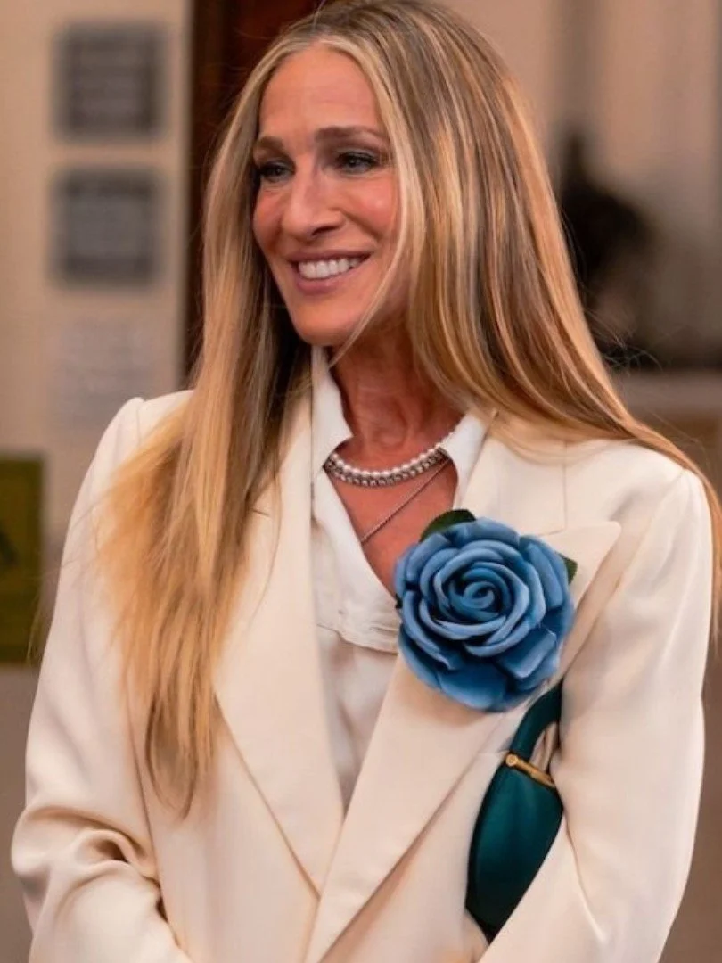 carrie blue flower on blazer.jpg