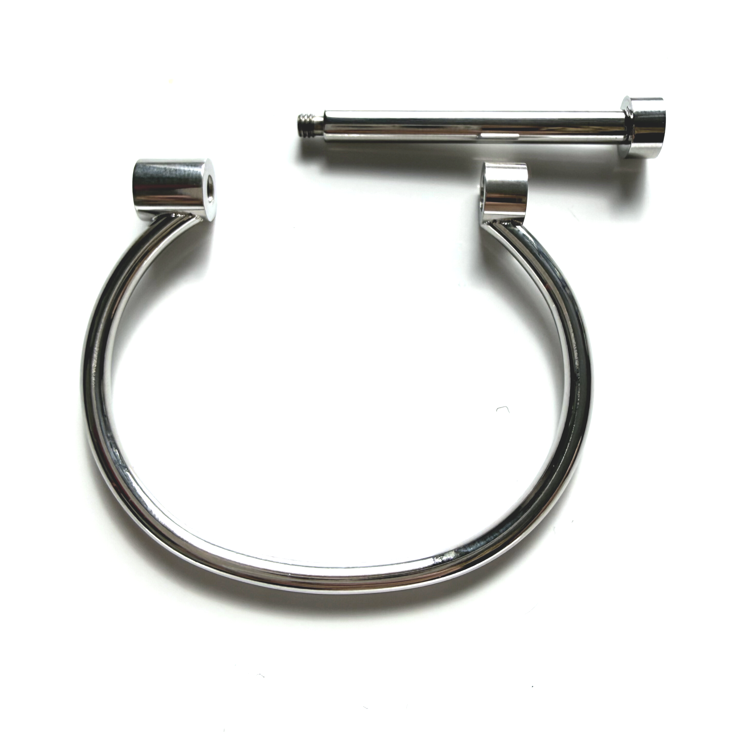 Close-up of functional screw-bar closure on stainless steel bangle.