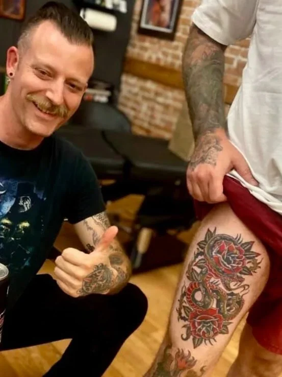 Traditional snake and roses