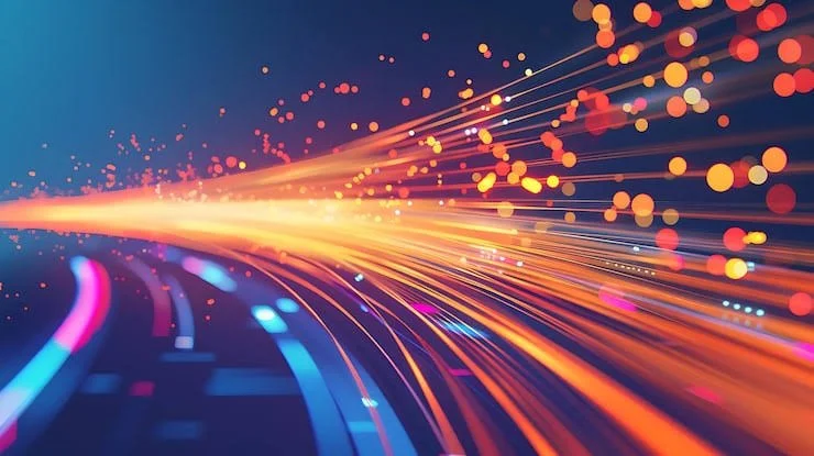 Light trails and bokeh effects resembling high-speed motion on a digital or futuristic background.