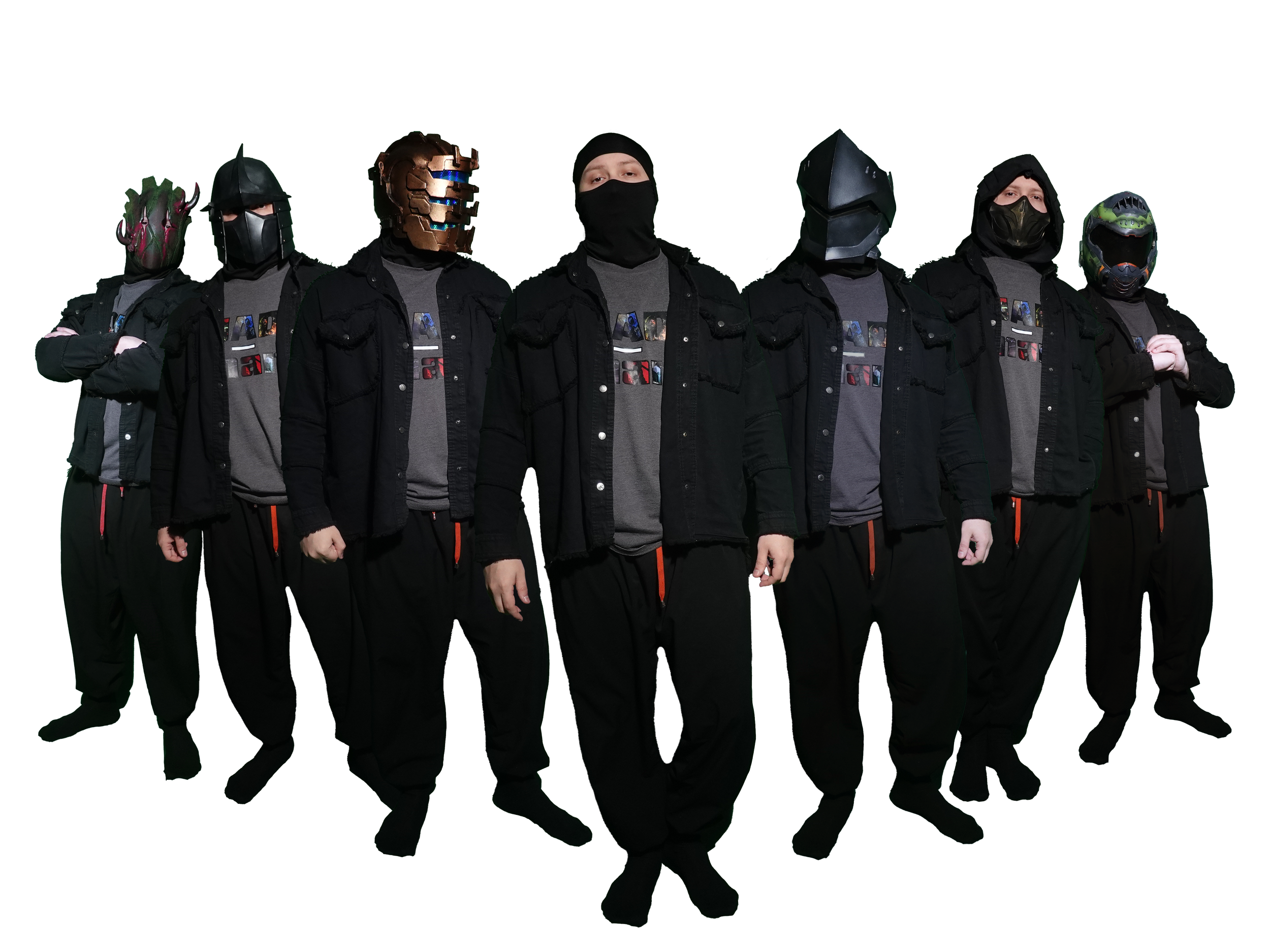 Group of seven people dressed in dark clothing and wearing superhero or costume masks, standing with crossed arms or hands at sides.